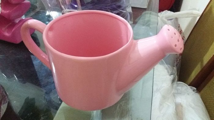 Regador, tbm vou colocar flores.