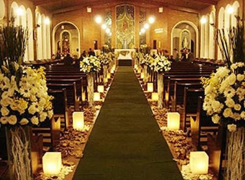 Decoração igreja com flores e velas