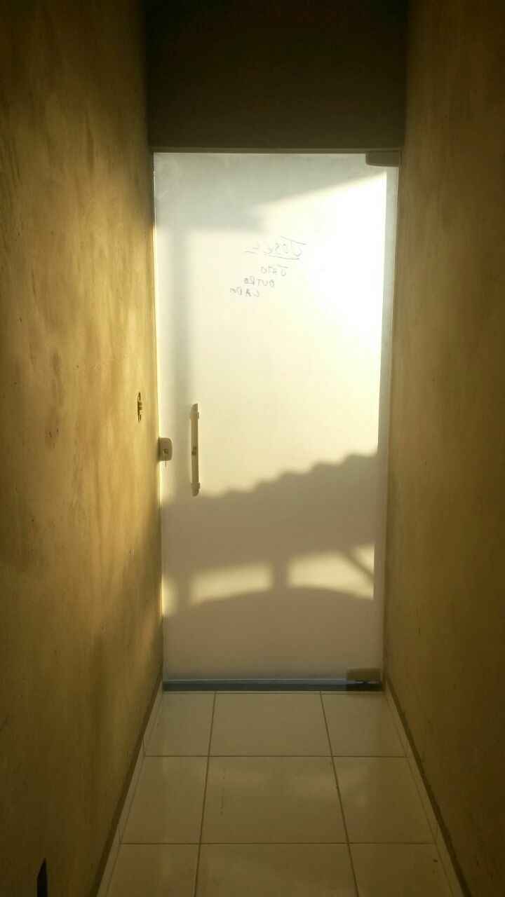 Porta do corredor que dá para área de serviço
