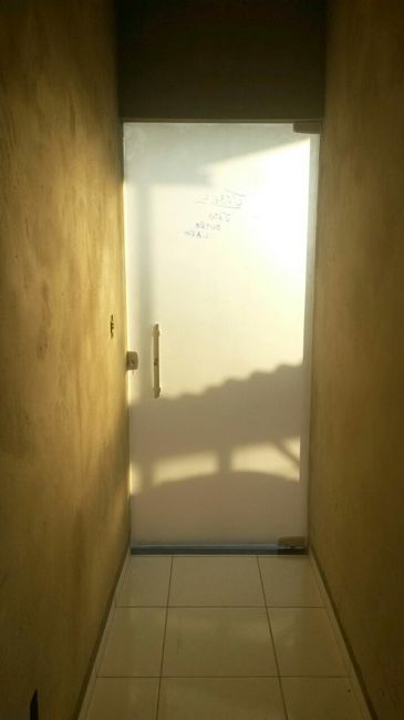 Porta do corredor que dá para área de serviço