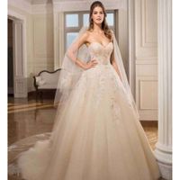 O vestido.