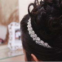 O meu foi preso com uns cachinhos solto ao lado 