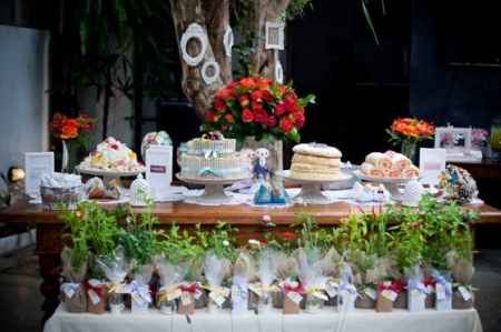 Mesa de bolo e doces
