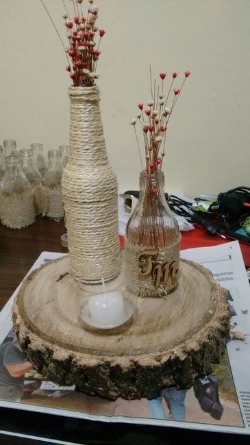 Ficou mais ou menos assim, mas enchi a boca delas com sempre viva, a garrafa com sempre viva mais ve