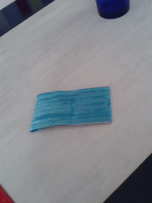 em seguida eu passei fita azul turquesa