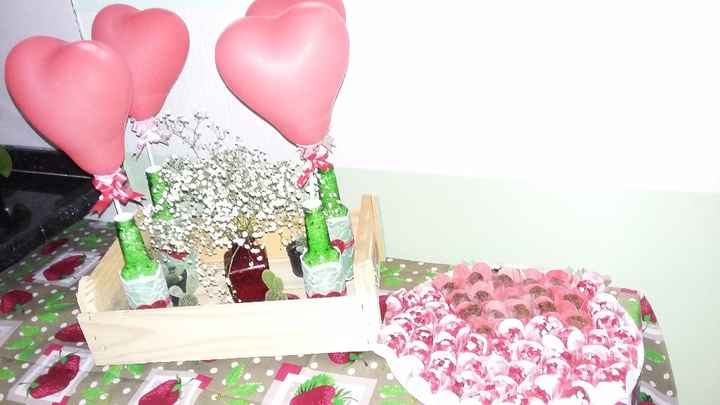 AS garrafinhas que decoraram as mesas e foram as lembrancinhas