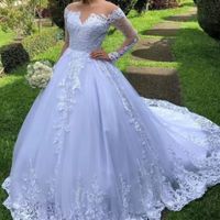 Quanto uma costureira deve cobrar para fazer um vestido de noiva sem os bordados? - 1