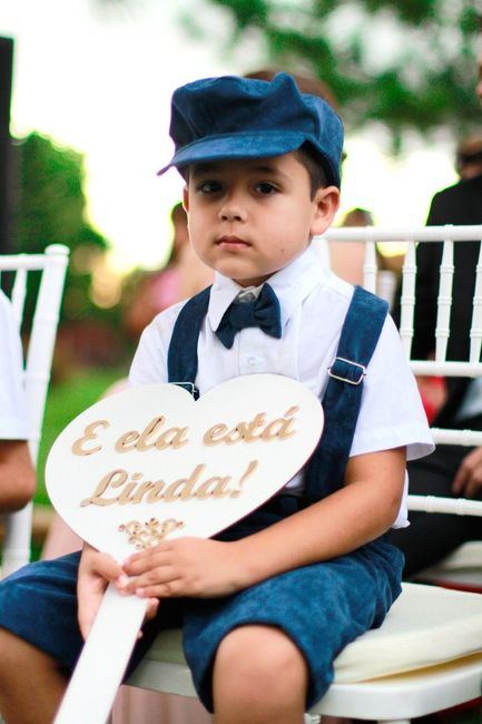 Hugo (primo e afilhado do meu marido) com placa