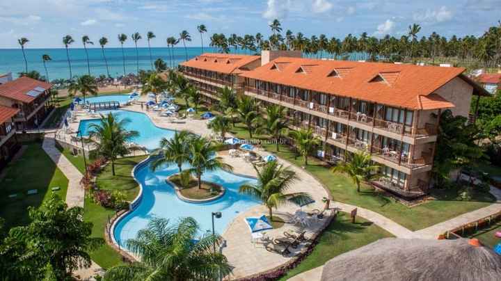 Parte da piscina e quartos