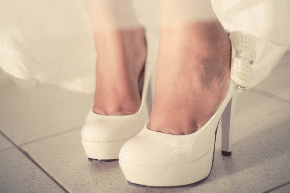 Os pés de uma noiva