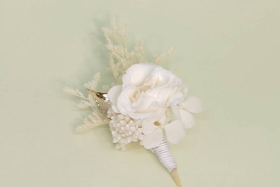 Boutonnière (flor de lapela)