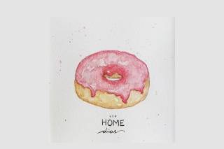 Mesa repleta de donuts