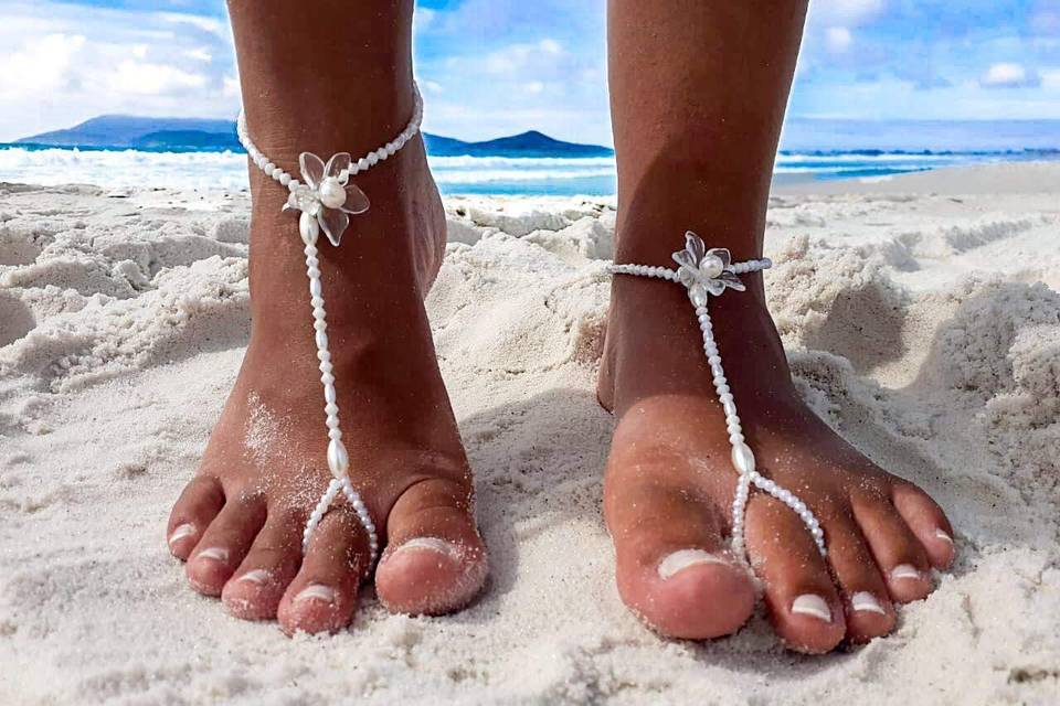 Sandália pé na areia