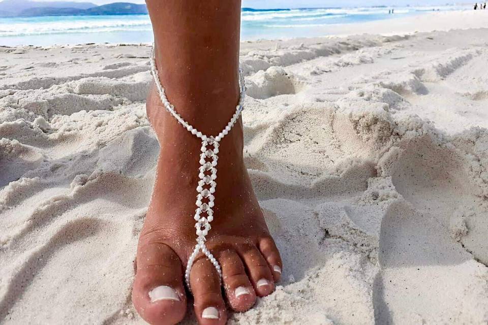 Sandália pé na areia