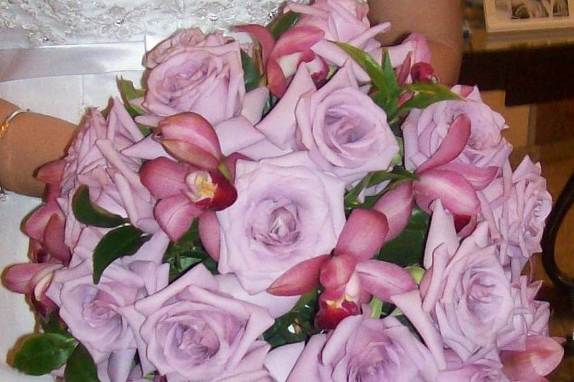 Bouquet de rosas e orquídeas