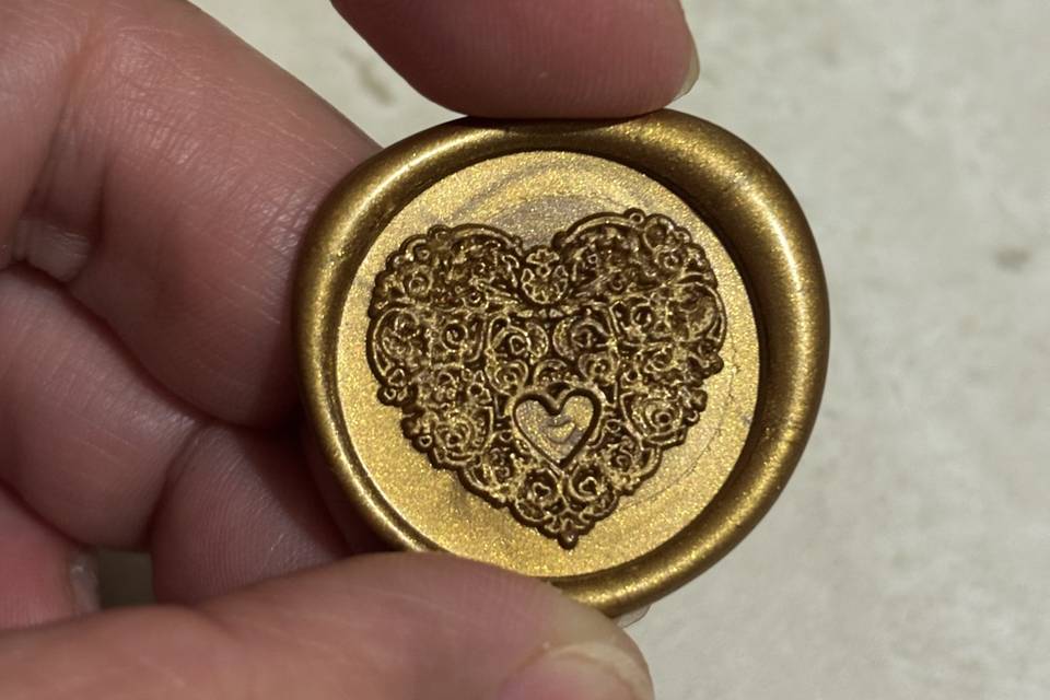 Lacre de cera dourado coração