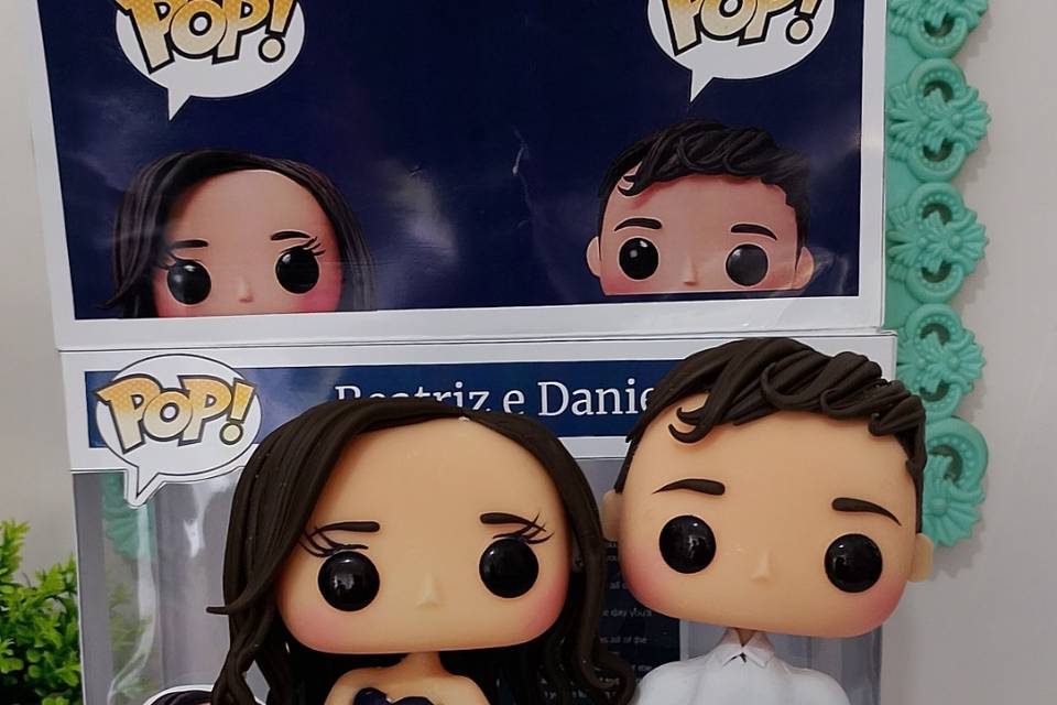 Casal pop topo de bolo