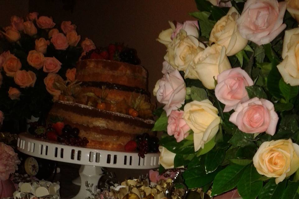 Mesa de bolo e doces