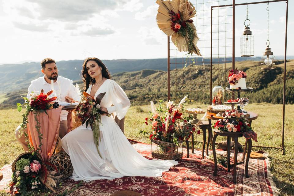 Mesa dos noivos e doces