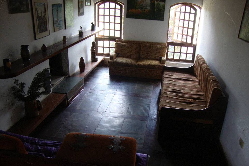 Sala lareira casa alta