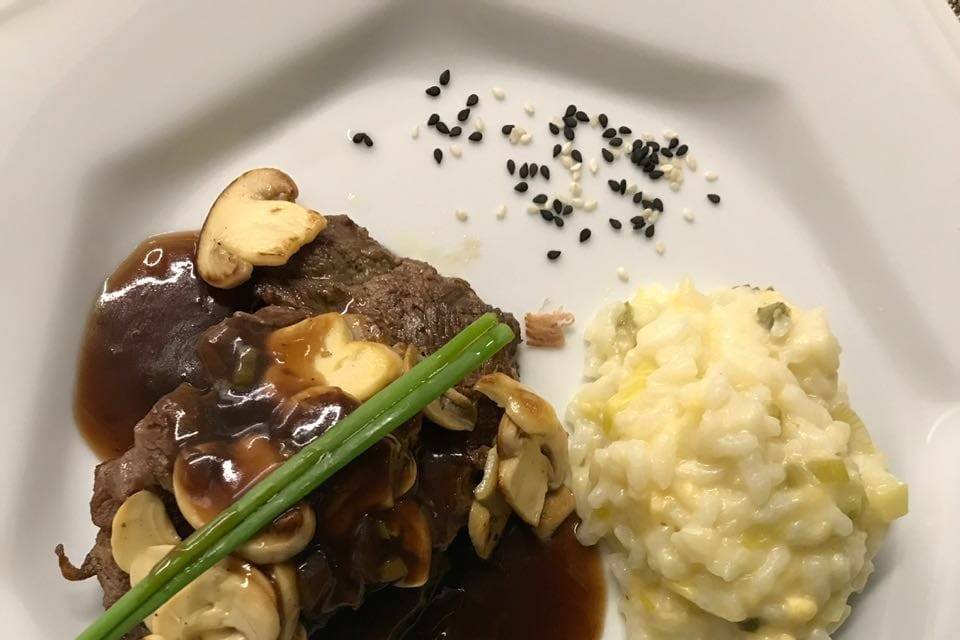 Mignon com risoto de alho poró